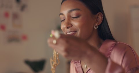 Happy, eating and chinese food delivery of a woman from India doing a happiness dance with chopsticks. Hungry Indian person with take out noodles with a smile dancing with gratitude at a house: stockvideo