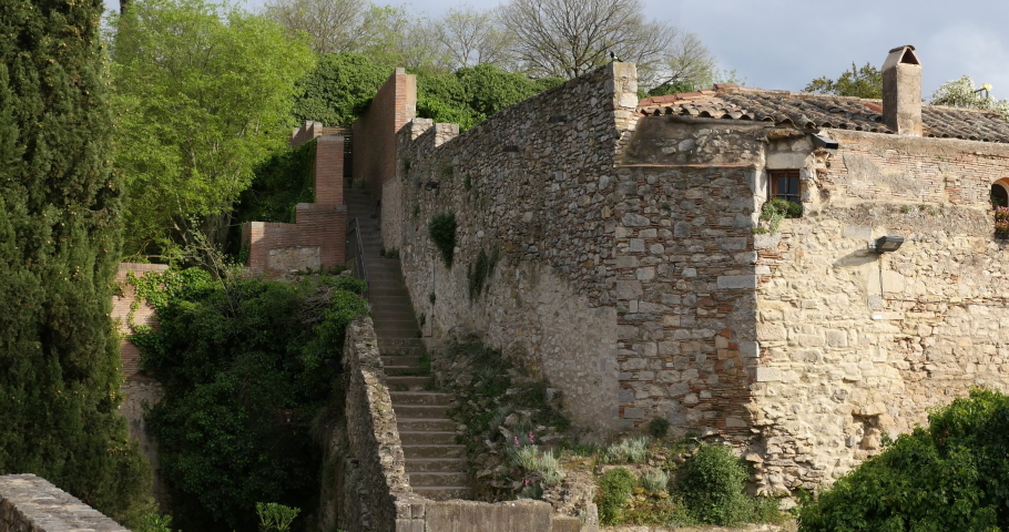 Girona walls walkaway, Catalonia, Spain. Narrow stone stairs on the Passeig de la Muralla. | Shutterstock HD Video #1094482861