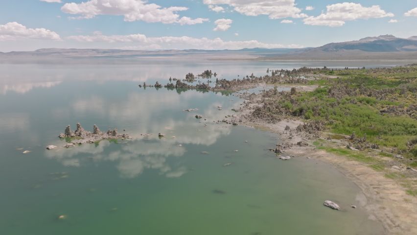 Aerial footage of Mono Lake Tufa State Natural Reserve near Yosemite National Park. Scenic getaway with dramatic calcium-carbonate spires. High quality 4k footage