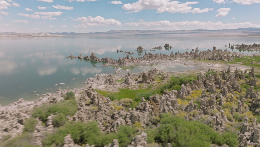 Aerial footage of Mono Lake Tufa State Natural Reserve near Yosemite National Park. Scenic getaway with dramatic calcium-carbonate spires. High quality 4k footage