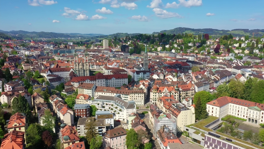 Aerial drone footage of the famous Saint Gallen historic old town with it famous Abbey of Saint Gall, now a cathedral, in Switzerland. Shot with a rotation motion. 