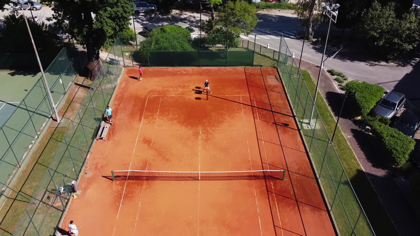 Drone aerial tennis court, futuristic tennis sport concept, augmented reality tennis match, future concept digitalization with AI data sport analysis Royalty-Free Stock Footage #1094492001