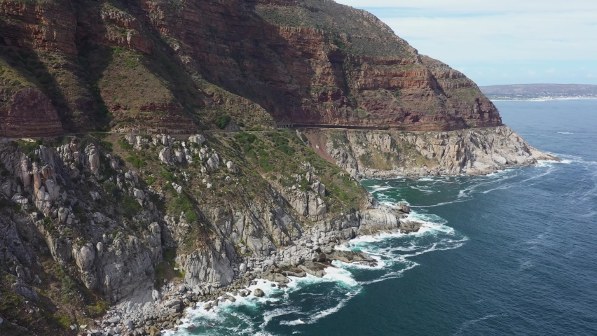 Rocky coast of Chapman's peak drive in Cape Town, South Africa. Aerial footage Royalty-Free Stock Footage #1094526215