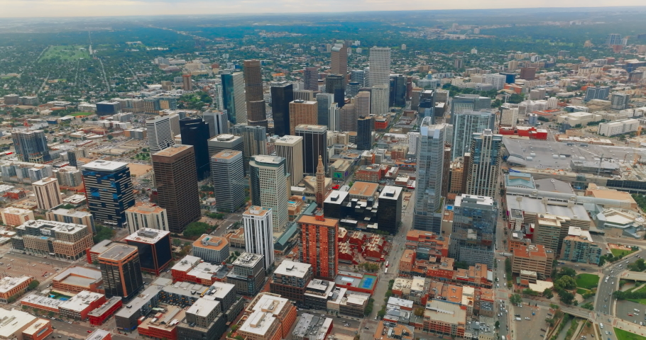 Gorgeous view of skyscrapers in the downtown of beautiful Denver, Colorado, USA. Metropolis centre at backdrop of green city at daytime from bird