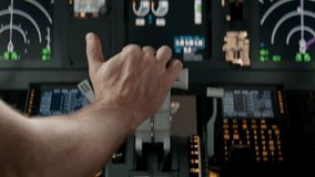 Commercial aircraft pilots controlling airplane throttle lever during the flight or take off. View from inside the cabin. Real aircraft, daytime shot - Powered by Shutterstock - Get 15% off with code: PIKWIZARD15