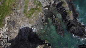 Seaside of the south of Ireland on a sunny day. Beautiful coast of the Celtic Sea. Aerial video in full hd format.