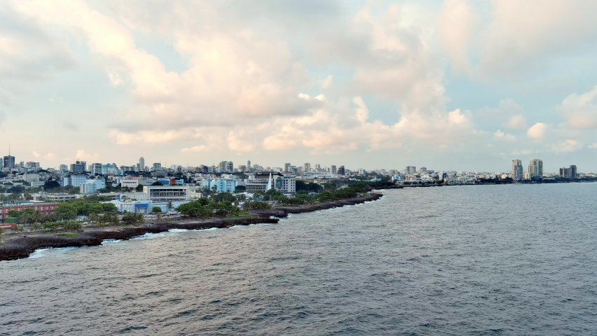 Aerial view over sea towards the cityscape of Malecon de Santo Domingo, Dominican Republic