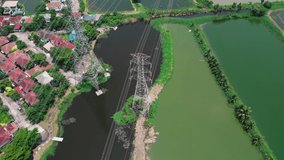 4K Video aerial drone shot of high voltage pole in Thailand.