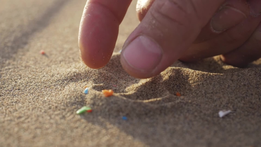 Microplastic contamination on the sand beach, MP contamination. different types of polymers identified in the sand. nanoplastics, NPs. sandy beach ecosystem, environment, marine pollution | Shutterstock HD Video #1094562657