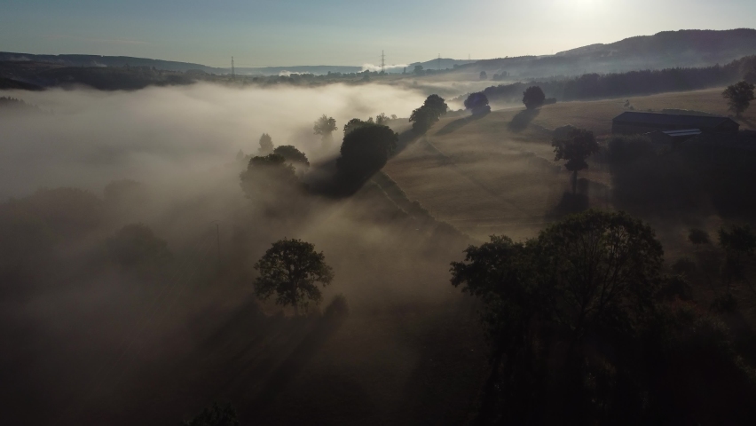 Fog in the valley of the Belgian Ardennes near Chevron, Liège. Aerial