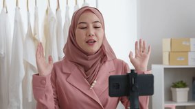 Islam r arab influencer vlogger or beauty blogger live smile talk on social media vlog  Enjoy share selfie viral video sale online on small shop trendy job for asia people Gen Z girl