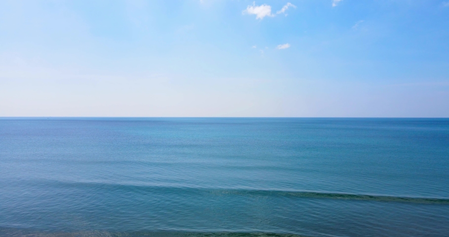 Blue ocean sea horizon as far as the eye can see One part sky, one part sea. Aerial view shot by drone camera  | Shutterstock HD Video #1094577697