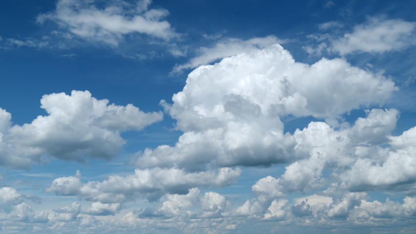 Sky with bautiful silky clouds. Puffy fluffy cumulus and cirrocumulus clouds. Timelapse.