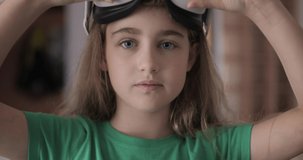 Portrait of Teenage girl Using VR Glasses on Face. Child Experiencing Innovative Technology, Virtual Reality. Education Children, Technology Science.