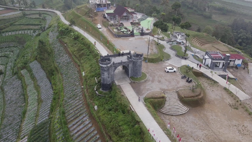 Aerial view, Beautiful scenery of the slopes of Mount Merbabu in Negeri Khayangan with the castle door icon.