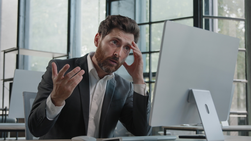 Caucasian 40s bearded boss investor entrepreneur employer man in office with computer working typing has problem with online project incorrect data in service lost connection bad result upset failure Royalty-Free Stock Footage #1094612343