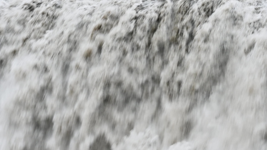 Powerfull waterfall Dettifoss in Iceland closeup