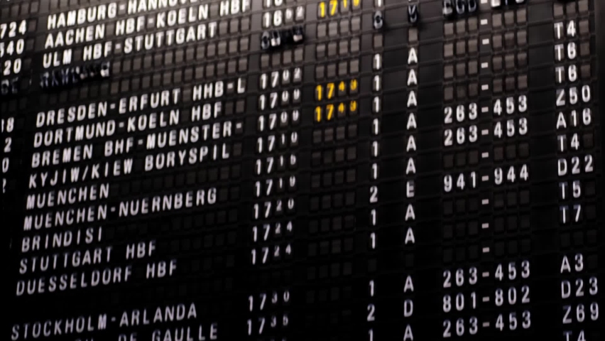Flight Departures information board at Frankfurt Airport in Germany, black scoreboard, concept delay, flight cancellation, arrival time, flight to Stuttgart, berlin, paris, london, Istanbul Royalty-Free Stock Footage #1094623357