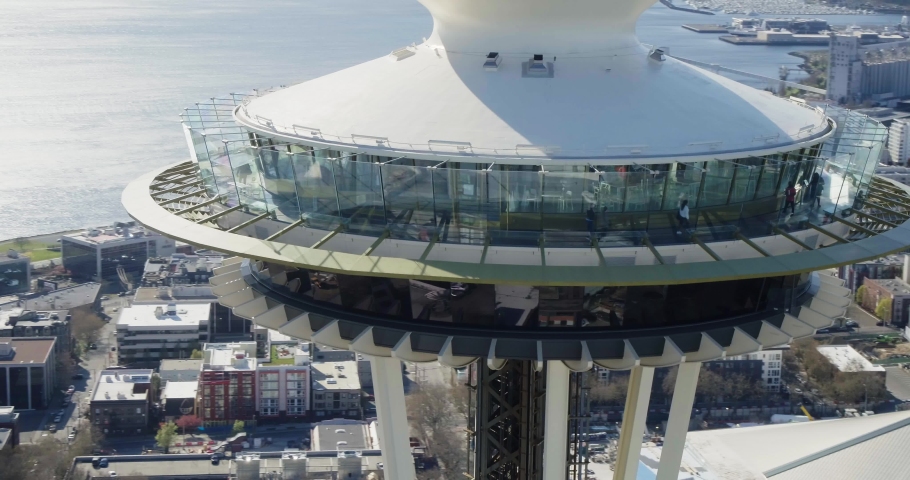 Seattle , Washington , United States - 09 14 2022: Drone orbiting viewing platform and deck on The Space Needle, Seattle