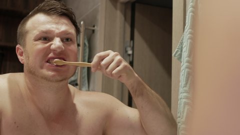 Handsome Young Man Brushes His Teeth Stock Footage Video (100% Royalty ...