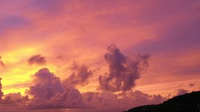 colorful light through to the cloud above the ocean.
Clouds are moving slowly in stunning sunset video 4K.
 Nature video High quality footage 
Scene of Colorful romantic sky sunset background.