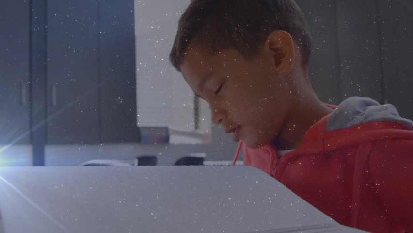 Animation of light trails over biracial schoolboy. Global education and digital interface concept digitally generated video.
