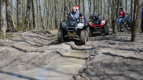 Man Woman Riding Atv Through Puddle Stock Footage Video (100% Royalty ...