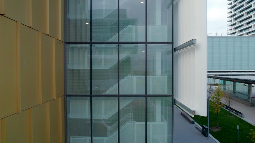 Vaughan Metropolitan Centre in Toronto, elevator going up revealing rooftop terrace.