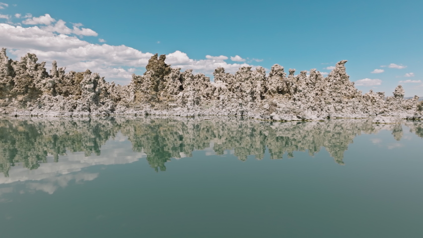 Aerial view of bizarre limestone formations that create a lunar landscape. Splendid fortified tufa citadels miraculously emerged from the Mono Lake. High quality 4k footage