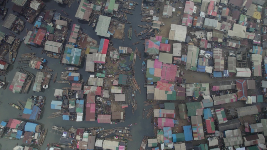 Houses built on a slum with canoes around them in Lagos Nigeria Royalty-Free Stock Footage #1094673027