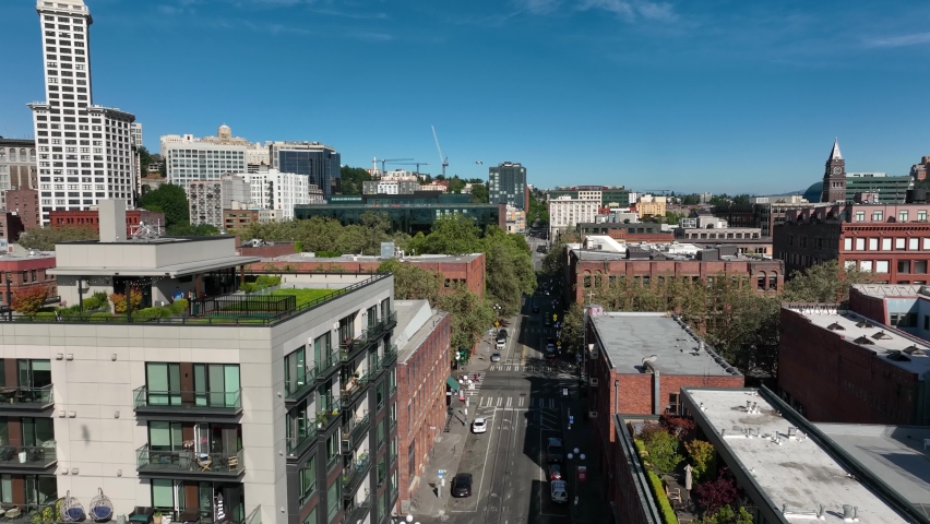 Aerial view of where Pioneer Square's fancy condos meet its worn down apartment buildings in Seattle. Royalty-Free Stock Footage #1094673661