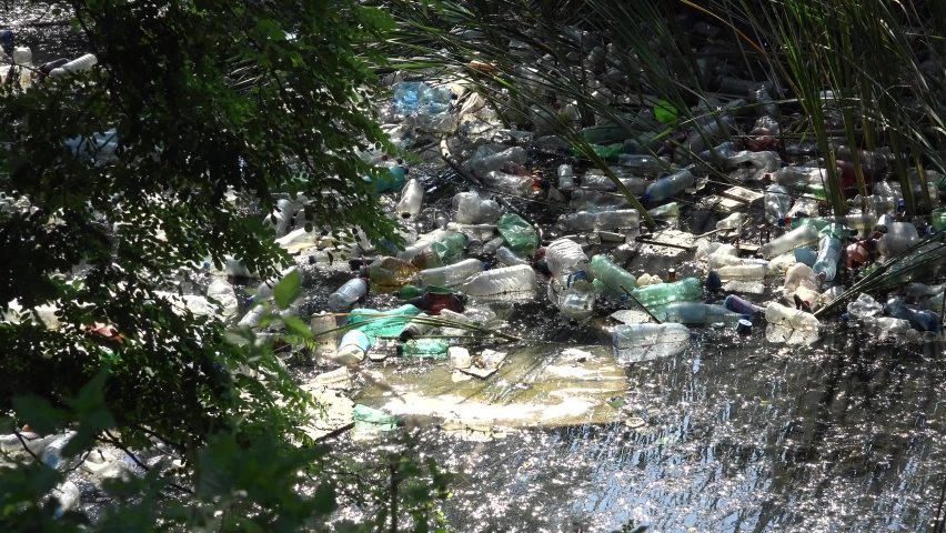 Pollution, Plastic Bottles in Mountain River, Garbage in Running Water, Trash Polluted, Polluting Nature, Global Warming Disaster | Shutterstock HD Video #1094696199