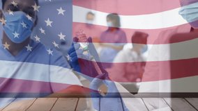 Animation of flag of usa over african american female doctor with vaccine. Global medicine, patriotism and digital interface concept digitally generated video. - Powered by Shutterstock - Get 15% off with code: PIKWIZARD15