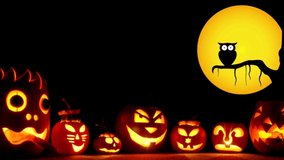 Spooky halloween cartoon animation with pumpkins with dark background of seamless loopable HD video