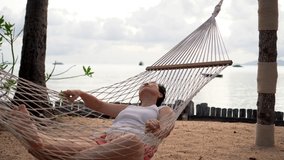 Asian senior couple playing have good laugh fun at tropical beach lasting marriage life - Powered by Shutterstock - Get 15% off with code: PIKWIZARD15