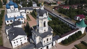 A drone flying from the ground to a bird's-eye view over the Vysotsky Monastery in Serpukhov, Russia.