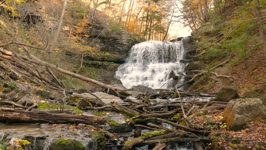 Stunning Autumn View Of Lower Decew Falls Cascading Through Rocks And Woods In The Forest. low angle