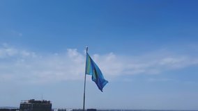 Kazakhstan national flag fluttering in the wind - Powered by Shutterstock - Get 15% off with code: PIKWIZARD15