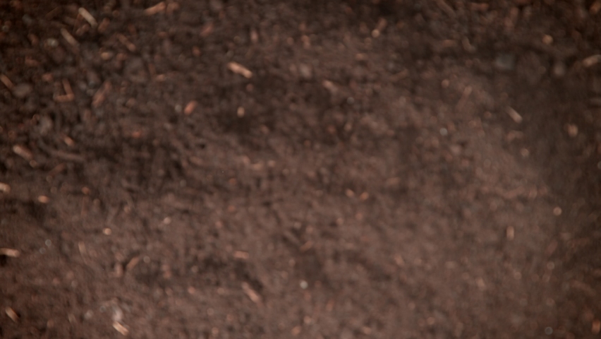 Super Slow Motion Shot of Exploding Soil Towards Camera at 1000fps. Royalty-Free Stock Footage #1094730165