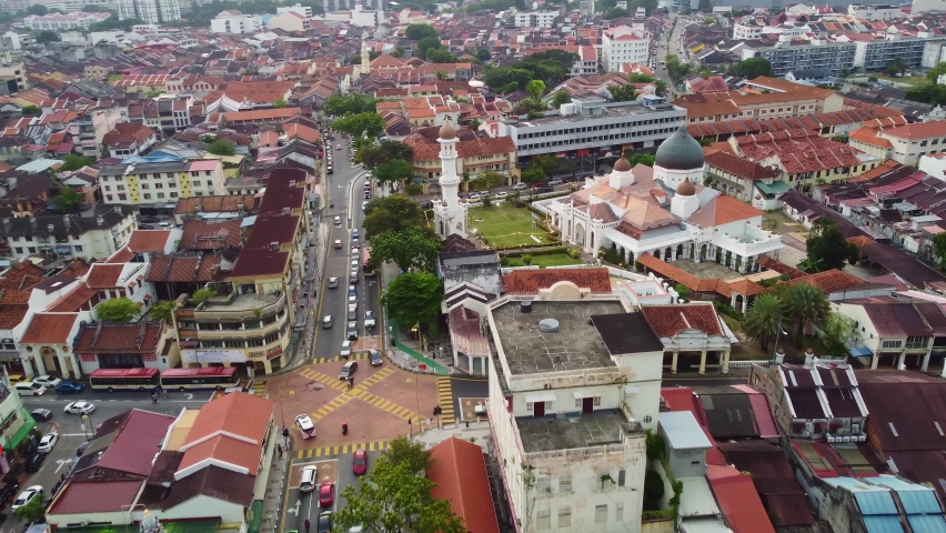 George Town, Malaysia: Aerial drone footage of the historic George Town city center with the Kapitan Keling Mosque in Penang island in chinatown and Little India