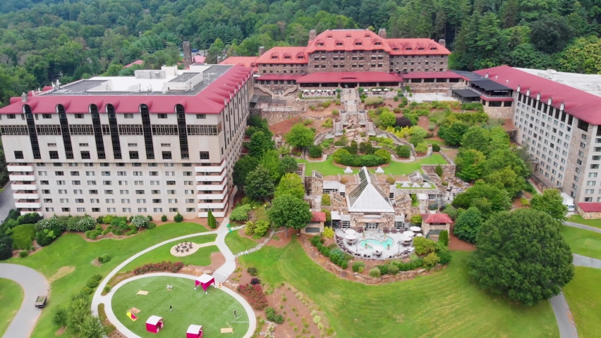 4K Drone Video of Convention Center, Spa and Golf Course at Historic Grove Park Inn in Asheville, NC on Sunny Summer Day Royalty-Free Stock Footage #1094740369