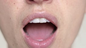 close up bottom woman face nose mouth using nasal sore throat spray or candy lozenges for sore throat treatment,viral illness.unrecognizable female medical concept,home therapy.4k real time video