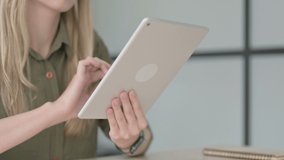 Close Up of Young Blonde Woman using Tablet - Powered by Shutterstock - Get 15% off with code: PIKWIZARD15