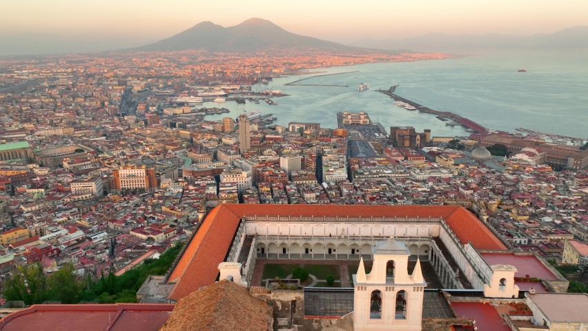 Naples at sunset, aerial view of Italian city of Naples and gulf of Naples, vacations in southern Italy, famous European tourist destination. High quality 4k footage Royalty-Free Stock Footage #1094762307