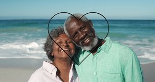 Animation of green hearts over african american senior couple on the beach. International day of older persons concept digitally generated video.