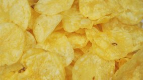 craft potato chips with cheddar cheese rotating close up