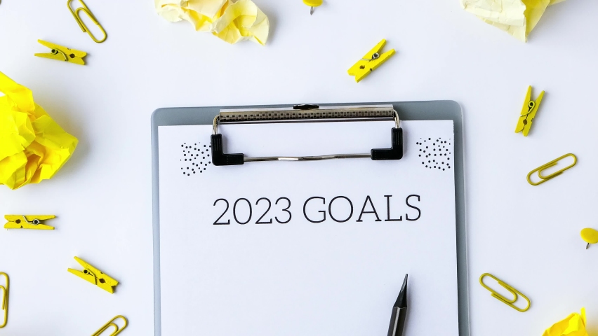 4k zoom in out 2023 goals. Yellow crumpled paper. Office supplies. Planning year concept. Copy space. Flat lay. Top view. Doubt concept. | Shutterstock HD Video #1094779219