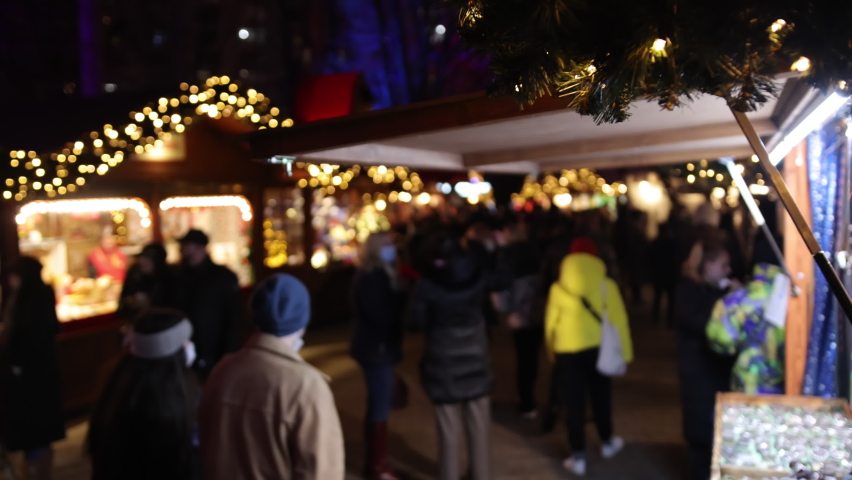 Berlin, Germany's Christmas market at night at Gendarmenmarkt at Winter Berlin, Germany's Advent Fair Decoration and Stalls with Craft Items on the Bazaar Royalty-Free Stock Footage #1094817367