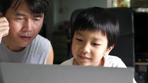 Authentic Asian Child Boy Using Laptop Stock Footage Video (100% ...