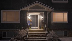 Establishing shot of luxury house with nice landscape at winter snowfall at night in Vancouver, Canada, North America. Night time on December 2021. ProRes 422 HQ. - Powered by Shutterstock - Get 15% off with code: PIKWIZARD15